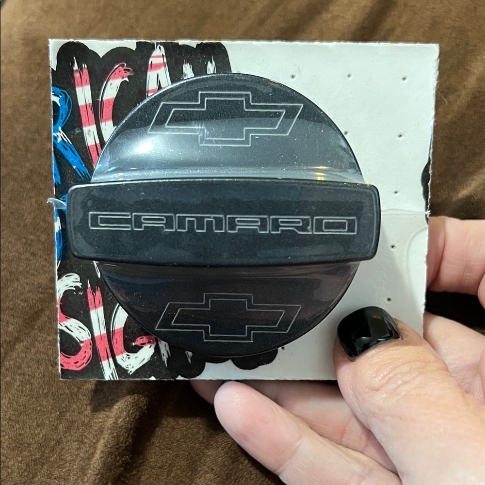 Brand new in sealed package. 2010-2015 Camaro Oil Fill Cap. Cyber Grey.